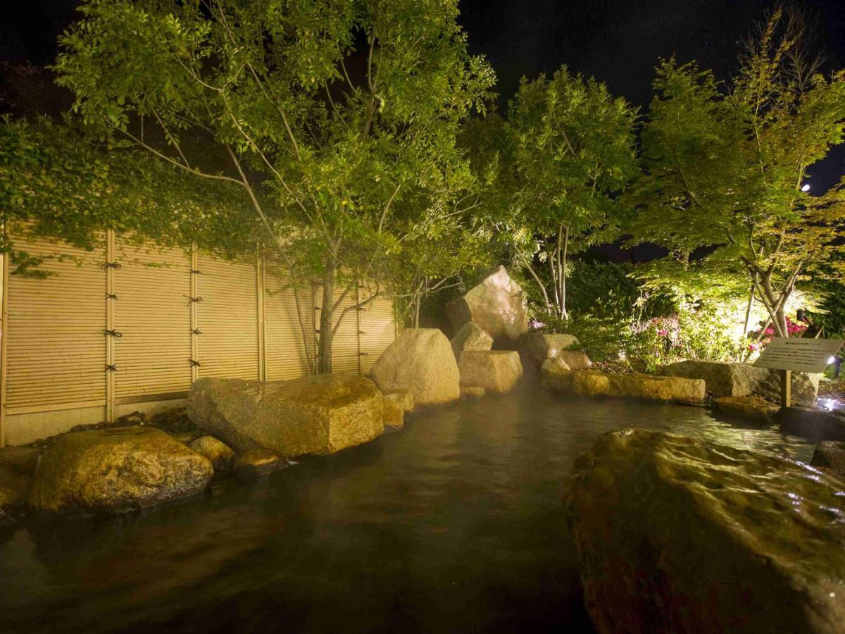 Hotel Okura Jr Huis Ten Bosch Sasebo Eksteriør bilde The river at night