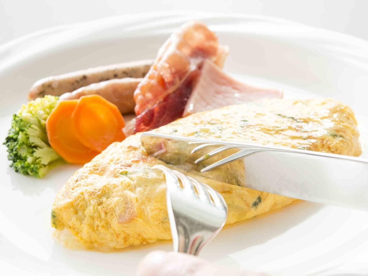 Hotel Okura Jr Huis Ten Bosch Sasebo Eksteriør bilde An omelette with ham and sausages
